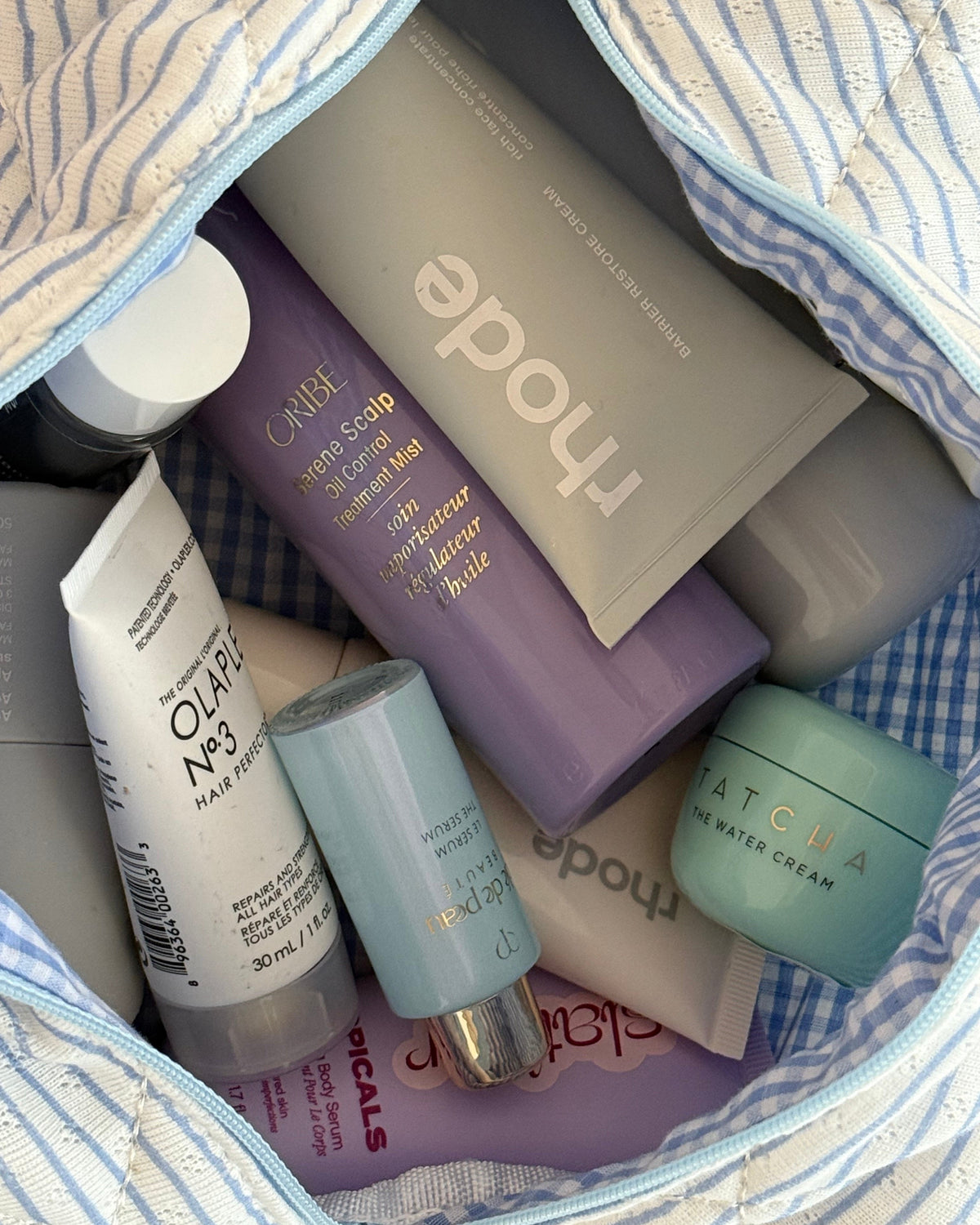 Trousse de maquillage bleu ligné