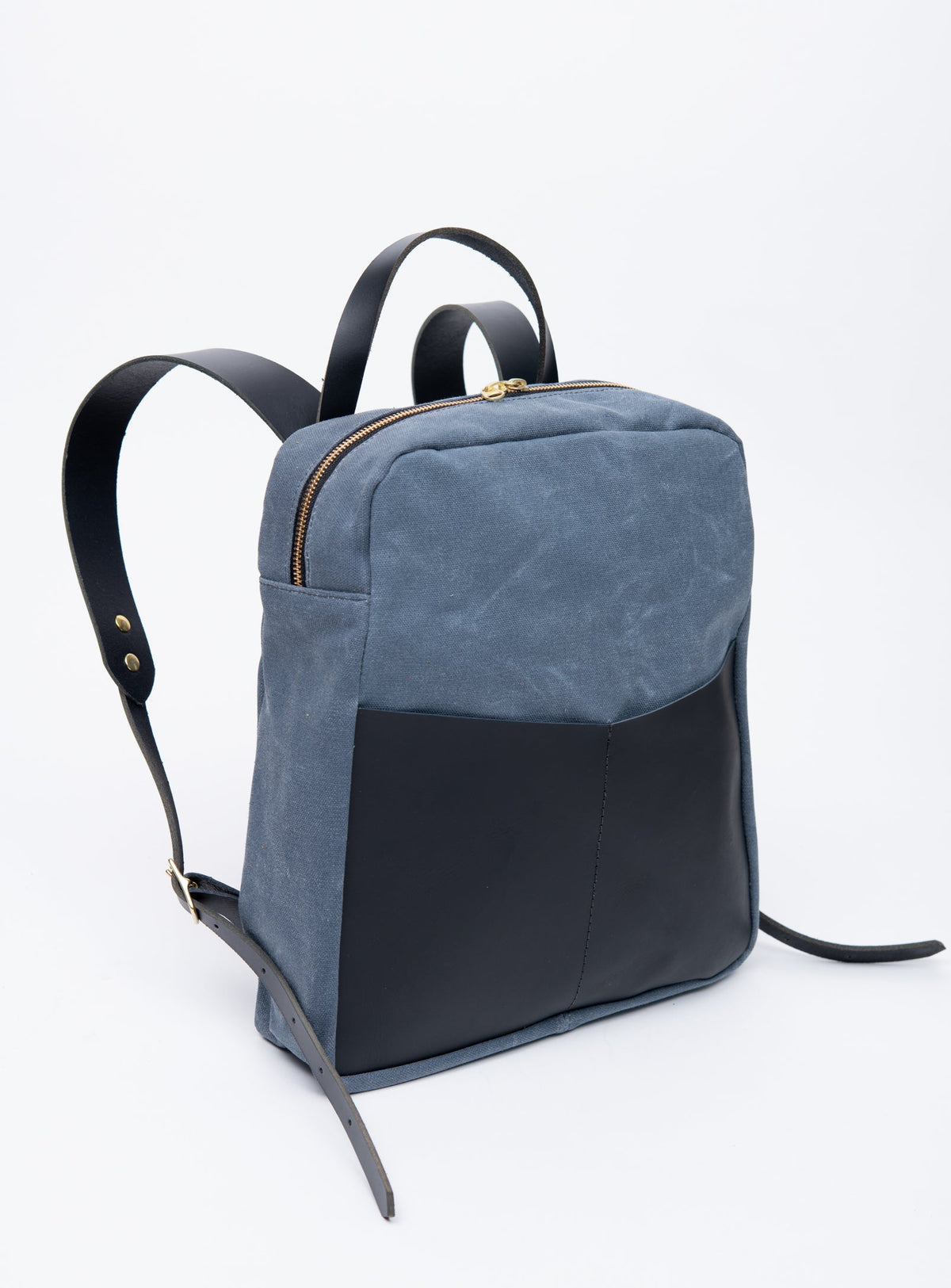 Sac à dos en cuir et coton ciré modèle GILFORD
