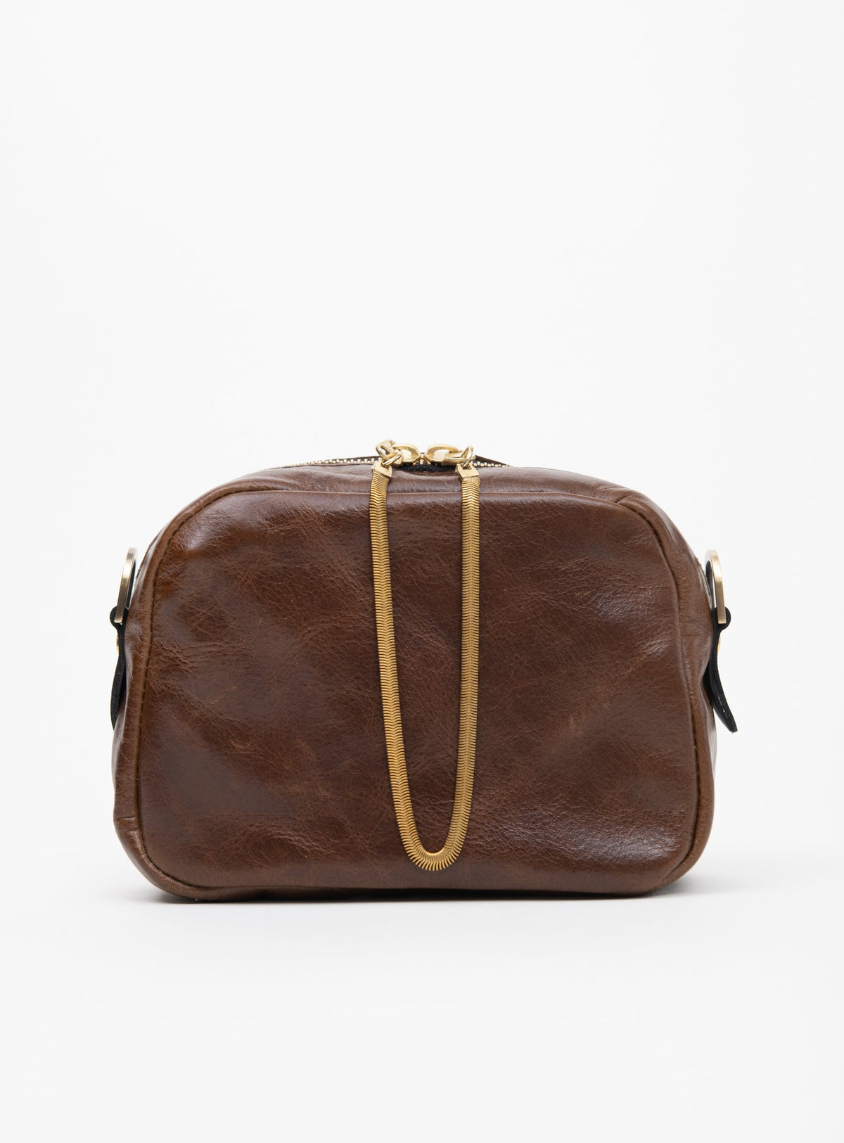 Sac à main en cuir avec ganse bandoulière et breloque de laiton modèle CARTIER