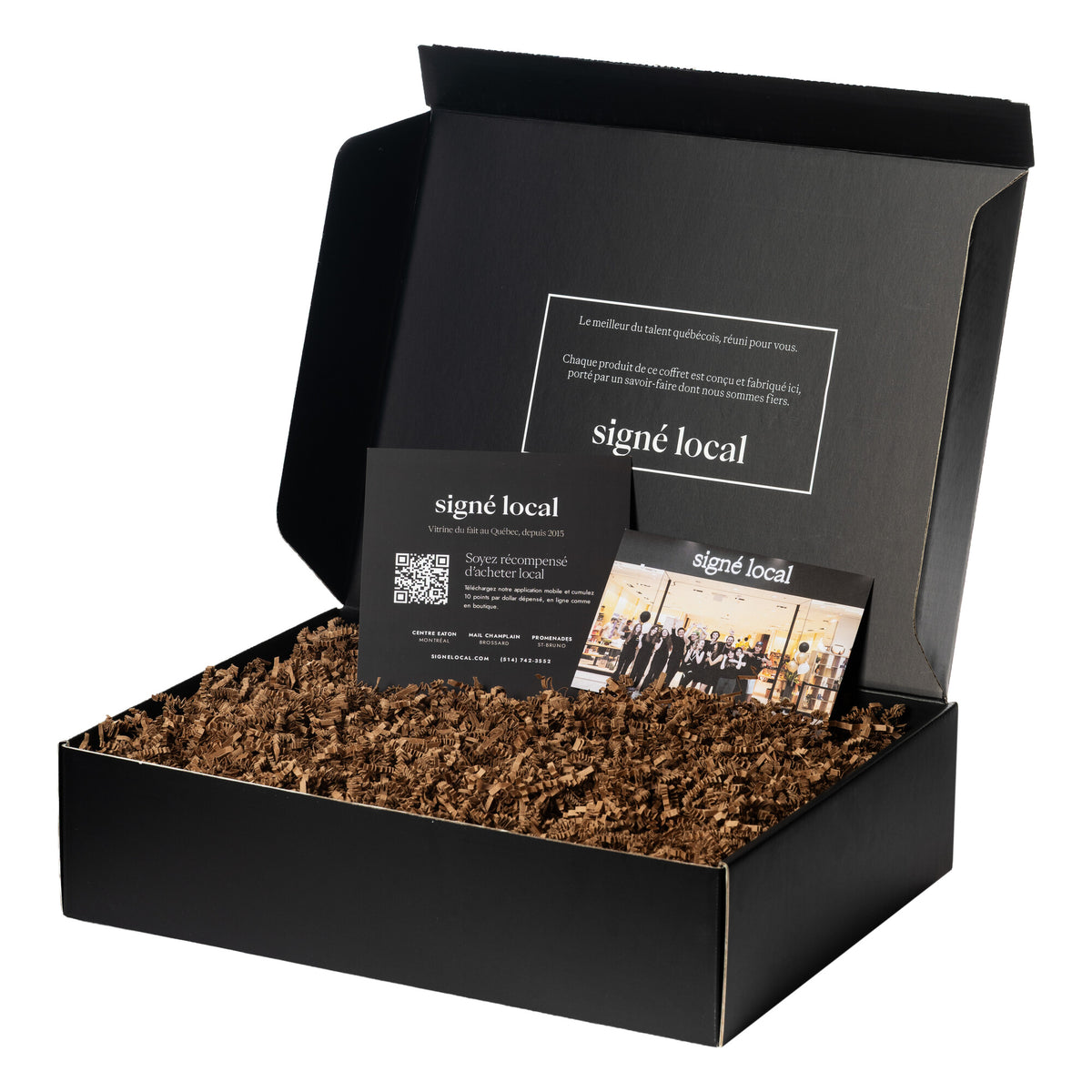Boîte cadeau Signé Local, édition de luxe : boîte noire ouverte avec cartes et frisure