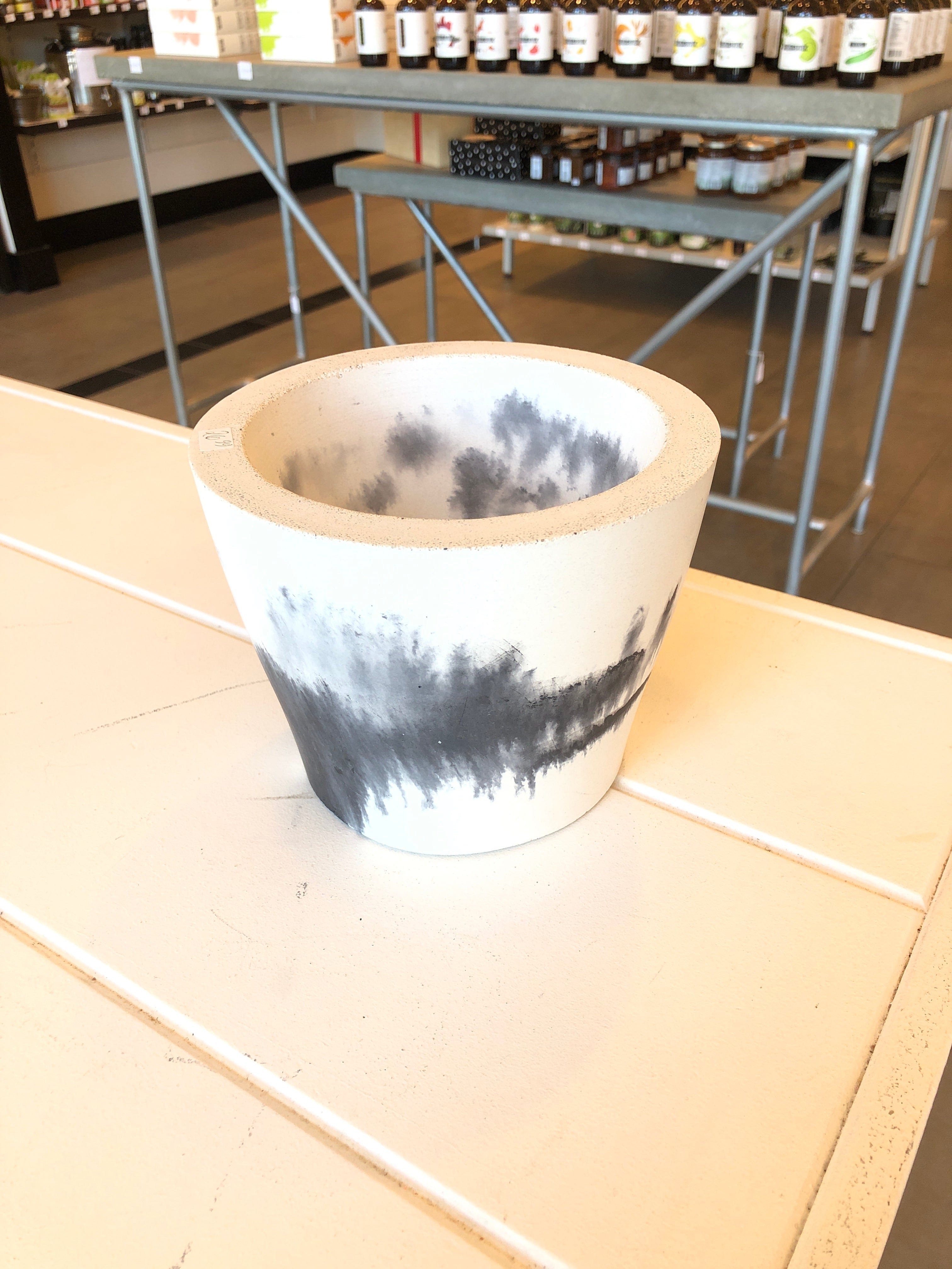 Cache pot en béton