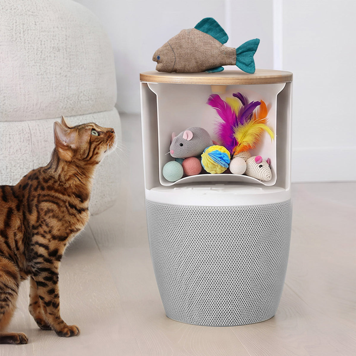 Storage under the oak top of the Bloom air purifier, filled with cat toys