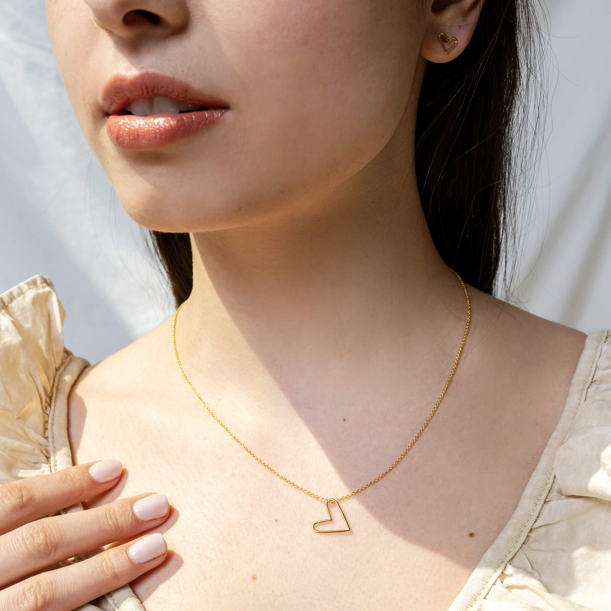Collier avec pendentif minimaliste en forme de coeur