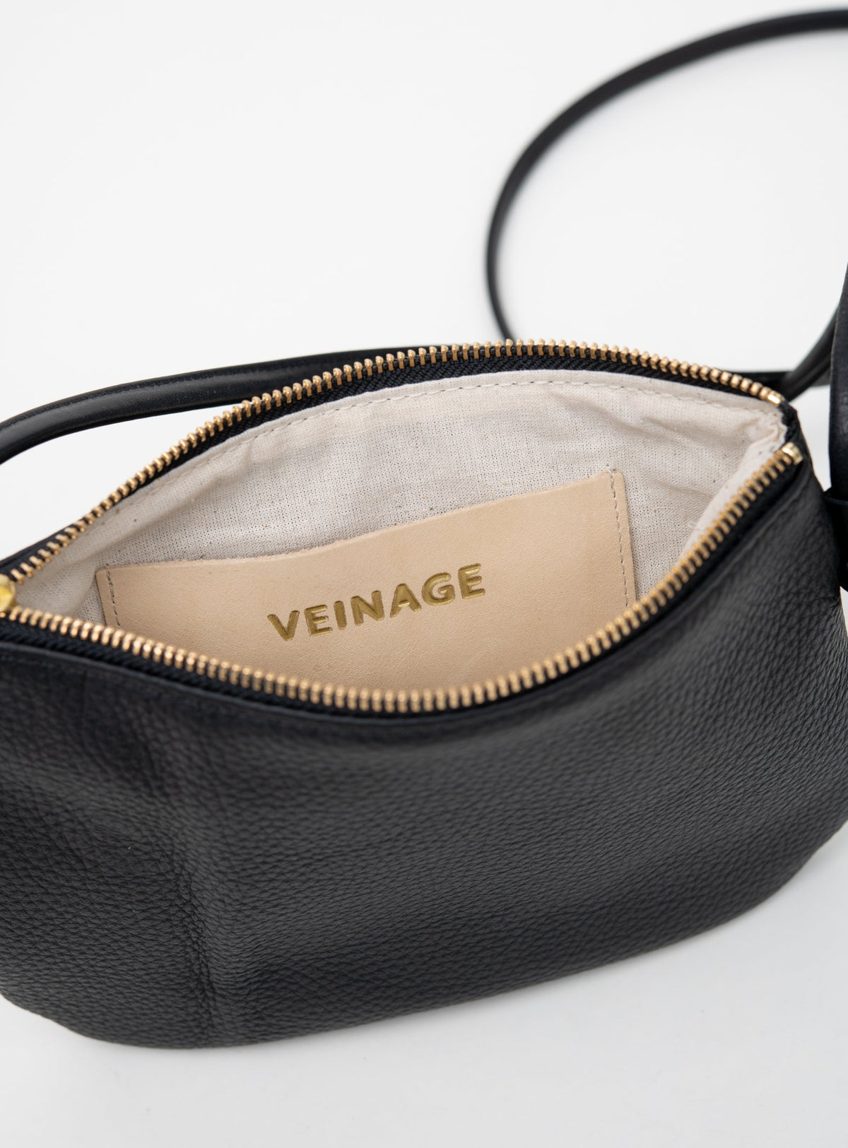 Petit sac pochette minimaliste en cuir modèle VENISE