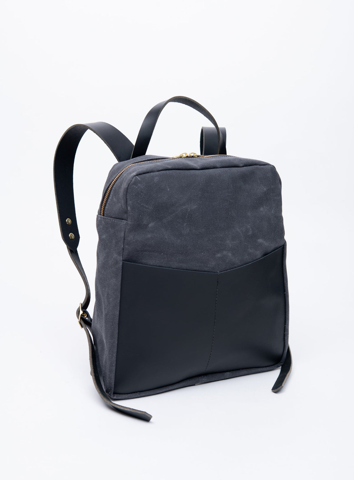 Sac à dos en cuir et coton ciré modèle GILFORD